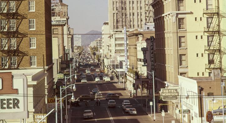Much of Herb and Dorothy McLaughlin’s photography documented the rapid growth of the Phoenix area in the mid-20th century. This photo shows downtown Phoenix’s Central Avenue, looking north toward North Mountain. By Herb and Dorothy McLaughlin