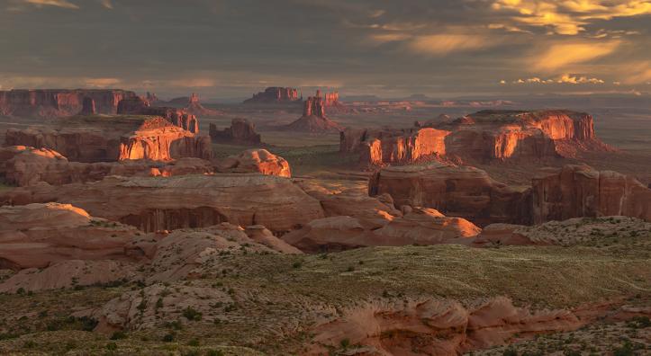 Sandstone buttes reach skyward in the Navajo Nation’s Monument Valley, as viewed from Hunts Mesa. | Derek von Briesen