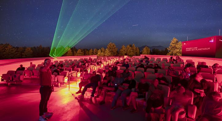 A presenter guides visitors on a tour of the night sky at Lowell Observatory. By Dawn Kish