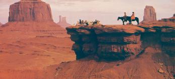 Two Navajo Women on Horseback at John Ford Point