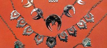 These silver necklaces, some of them accented with turquoise, were created by members of the Hopi Silvercraft Cooperative Guild. | Thomas A. Donohoe