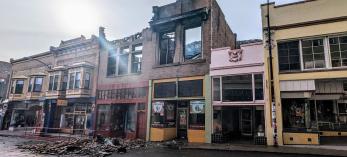 Burned buildings on Tombstone Canyon in Bisbee after a February 2024 fire