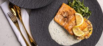Plates of food and appetizers at Teatro. Photograph by John Burcham.