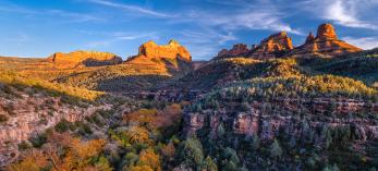  Autumn color mingles with Red Rock Country sandstone in a lower section of Oak Creek Canyon. By Guy Schmickle