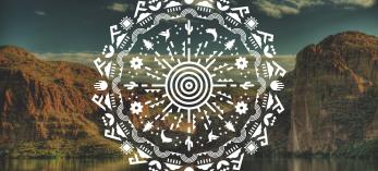 A white image that incorporates native imagery appears against a background of sky, water and mountains. 