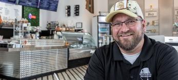 Trevor Glauser pictured at his Gilbert yogurt parfait bar. By Paul Markow