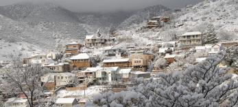 Storm clouds and heavy snow cover Bisbee, Arizona.