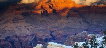 Winter storm clouds clear from the Grand Canyon’s Brahma and Zoroaster temples, two of the gorge’s most recognizable landmarks. This view is from the South Rim’s Yavapai Point, just northwest of the Grand Canyon Visitor Center. By Adam Schallau