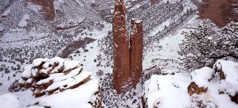 Heavy snow covers the summit of Spider Rock and the surrounding landscape of the Navajo Nation’s Canyon de Chelly National Monument. By Claire Curran