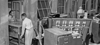 Raymond Carlson (left) helps move furniture from our first office.