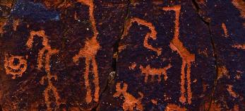 Petroglyphs carved by the Sinaguan people adorn the sandstone walls of the V-Bar-V Heritage Site. | David Muench
