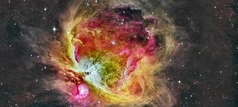 Red and yellow hues feature prominently in this colorful deep space photograph by Ken Naiff.