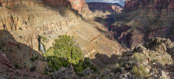 Thunder River Falls pours from an opening in a steep cliff in the Grand Canyon. From here, the Thunder River — referred to in this story as Thunder Creek — flows for only half a mile to its intersection with Tapeats Creek, making it one of the world’s shortest rivers. By Rich Rudow