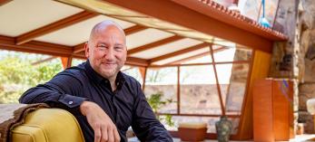 Joseph Specter is pictured in the living room of Frank Lloyd Wright's Taliesin West, in Scottsdale.