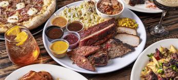 A selection of menu items available at Rim Country BBQ includes a barbecue plate, wood-fired pizza, wings, drinks and dessert.