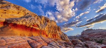 The colorful, textured “brain rock” of White Pocket, in the Vermilion Cliffs, is one of many geological wonders on the Colorado Plateau. By Claire Curran
