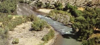 This Allen C. Reed photograph, titled Sun on the River, was one of three color images in our March 1951 story. The caption reads: “This part of the Verde Valley where there are fewer cliffs is typical of the country, which at one time supported a large Indian population living in hilltop pueblos.”
