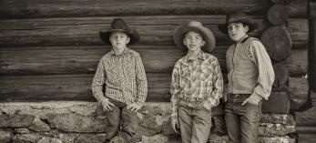 Vinson Picozzi, Keaton Jasso and Kaden Summer are shown at the X Diamond’s Voigt Allotment in the Apache-Sitgreaves National Forests. By Scott Baxter