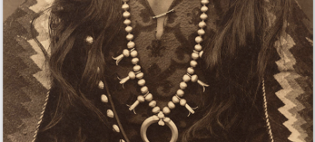 A book cover shows Navajo "Gunshooter" in a sepia toned image. He's wearing tradition clothing and a large squash blossom necklace. 