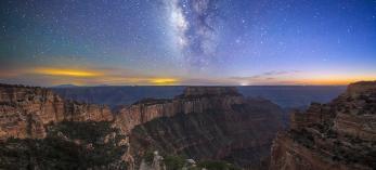 Stars and the Milky Way fill the night sky over Wotans Throne in a view from Cape Royal, on the Grand Canyon’s North Rim. The Canyon’s world-renowned dark skies have made it a haven for stargazers — and, since 2021, the home of an astronomer-in-residence program sponsored by Grand Canyon Conservancy. | Sean Parker