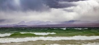 Storm clouds whip up waves on Lake Mohave. By Joel Hazelton