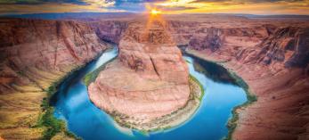 Horseshoe Bend offers an iconic view of the Colorado River near Page at sunset.