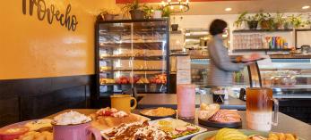 The bright and cheery atmosphere of Gloria's Bakery is a popular place to enjoy an assortment of breakfast plates and drinks. | Dawn Kish