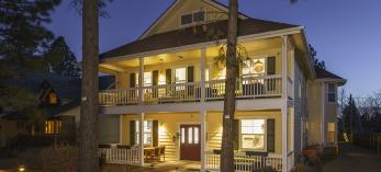 303 BnB Flagstaff is a two story yellow house with front porches that's tucked away in a quiet area of Flagstaff. By Laurence Parent