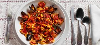 Pasta pescatore, topped with scallops, calamari, shrimp, clams, mussels and a homemade red sauce. | Steven Meckler