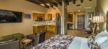 Prickly Pear Inn room interior offers plenty of space, including a kitchenette and beamed ceilings. | Laurence Parent
