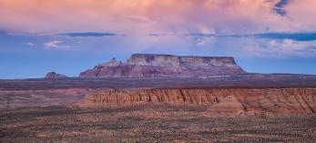 The view east from Navajo Route 20 includes LeChee Rock, shown here at sunset. | Gary Ladd