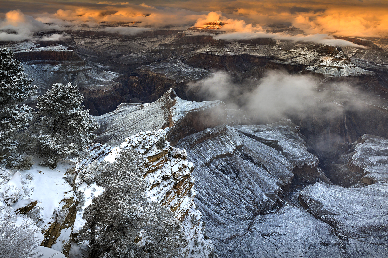 Photo by Glenn Tamblingson  |  A heavy snow blankets the Grand Canyon all the way to the Colorado River taken at Hopi Point