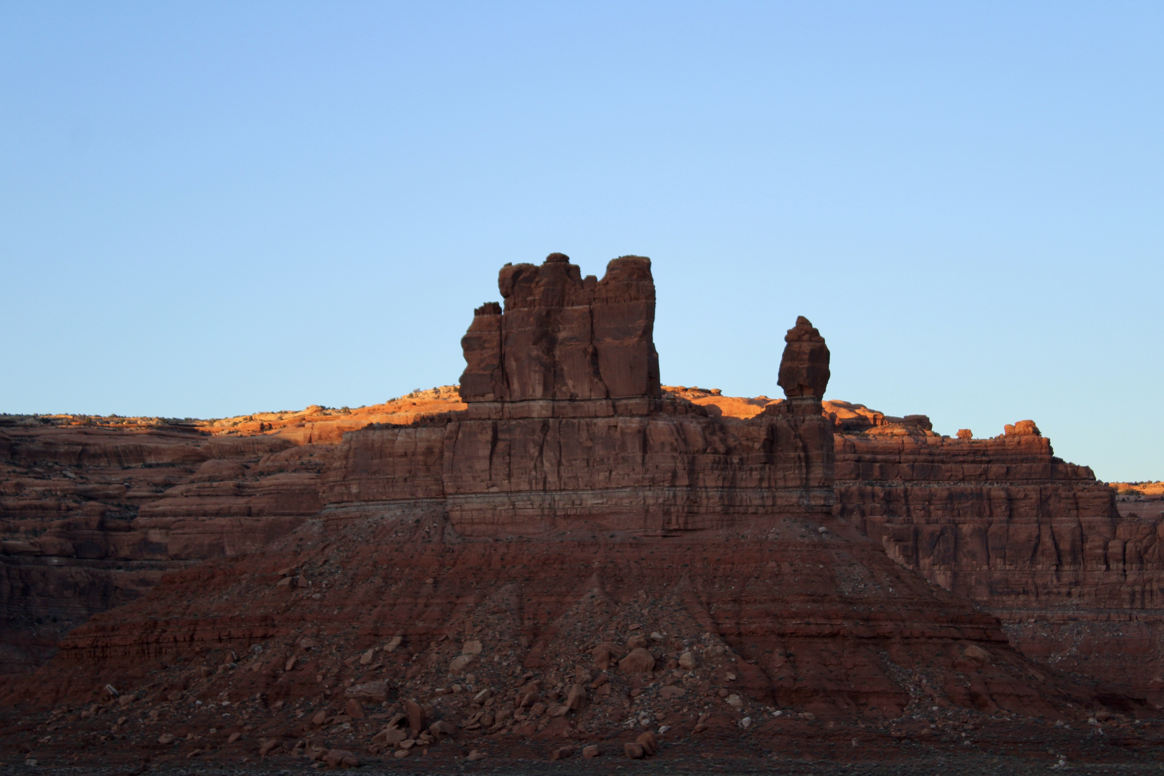 Photo by Elizabeth LeBlanc  |  Rock wall in monument valley at sunset