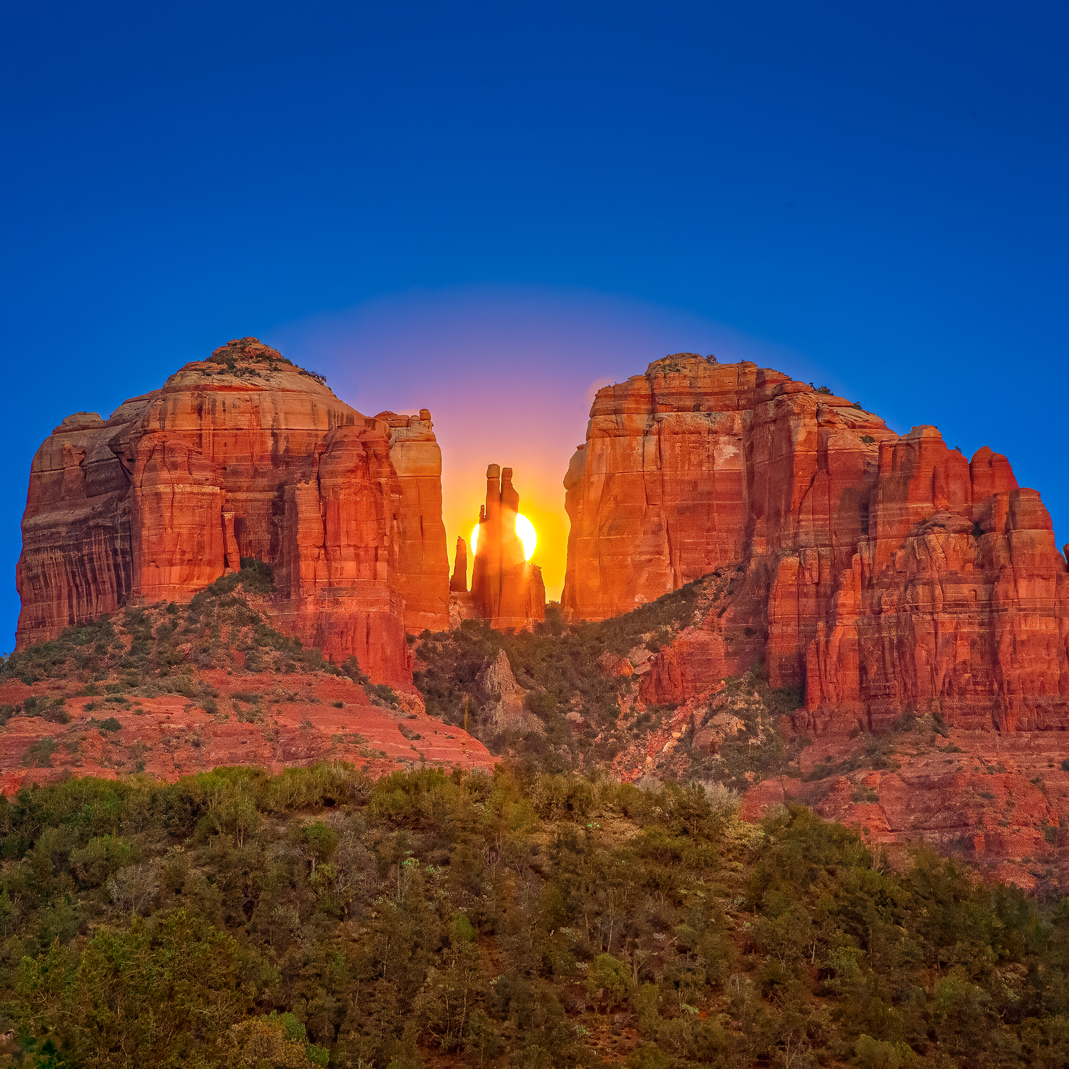 Photo by Susie Reed  |  When I moved to Sedona 20 years ago, I decided to shoot Cathedral Rock in as many ways as possible. I’m still love doing so. This shot of the moon rising between the spires is one of my favorites.